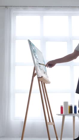 portrait of the artist at work