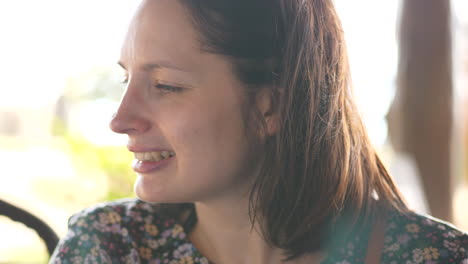 woman talking to child, close portrait