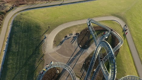 tiger and turtle - magic mountain sculpture in duisburg, germany