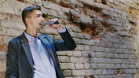 young frustrated businessman drinking alcohol from flasks in an abandoned house concept depression t