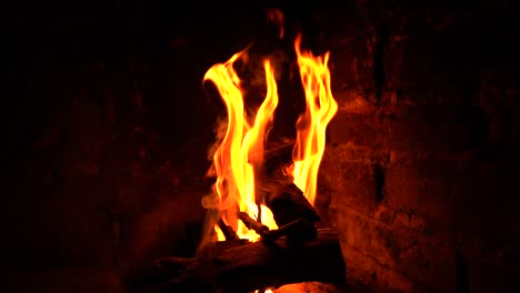 firewood burning inside the chimney