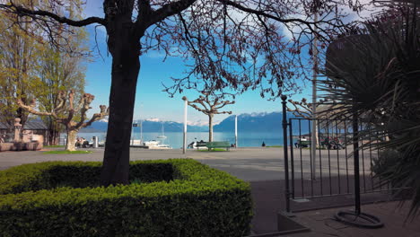 time lapse at lausanne, switzerland, near the geneva lake and with several people passing by