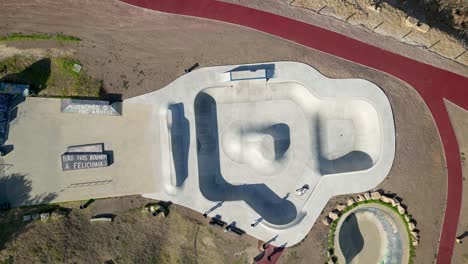 an aerial top-view perspective captures skatepark parque das gerações, situated at estoril, portugal, symbolizing leisure, fitness, and recreational activities for free time enjoyment