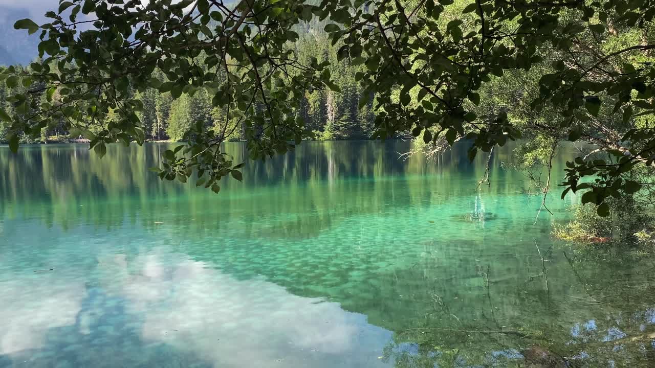 Alpine lake magic crystal clear green water