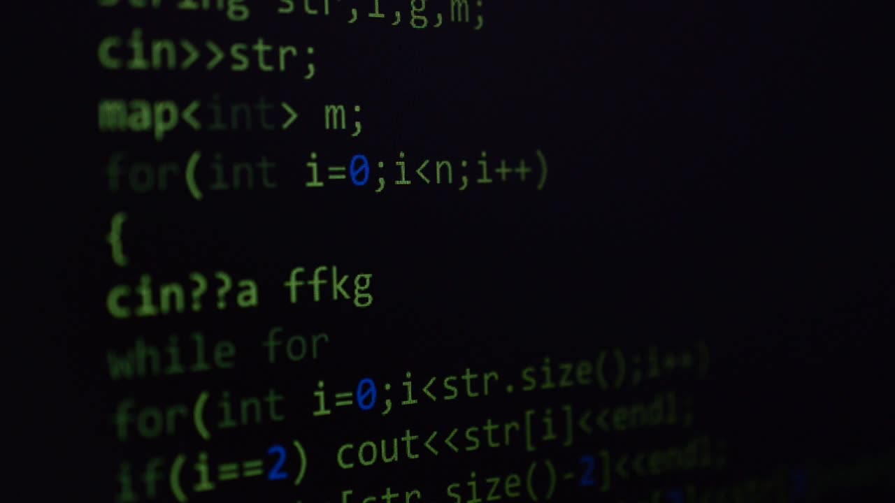 Source code on the monitor screen. Source code