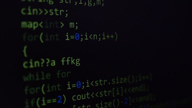 Source code on the monitor screen. Source code