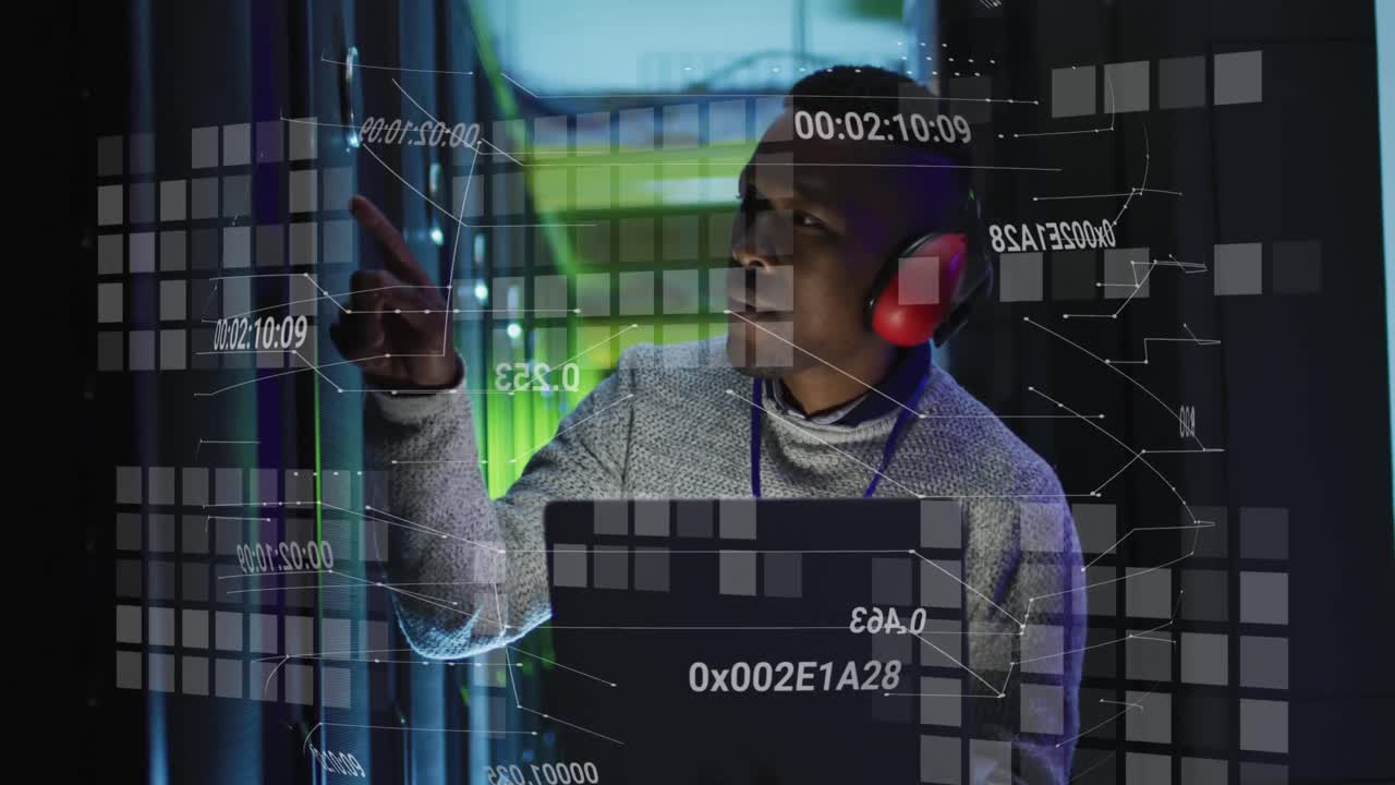 Animation of changing numbers over african american man working with laptop and servers