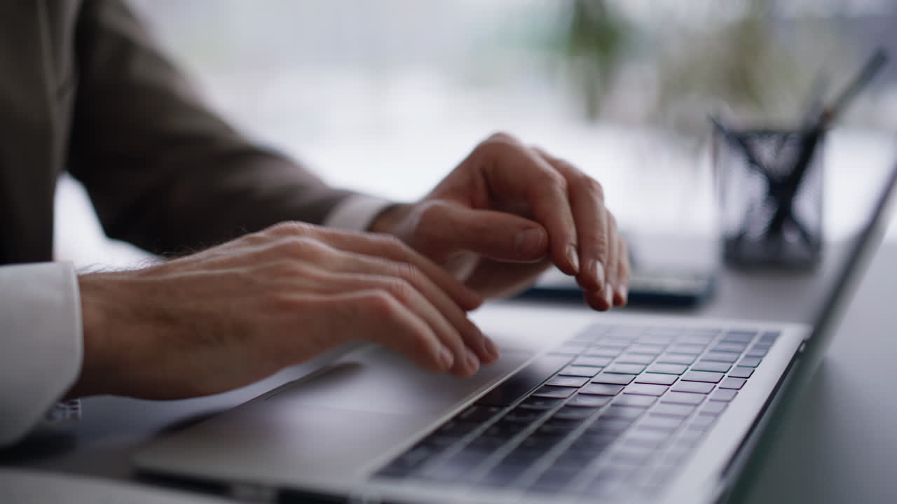 Man hands texting laptop keyboard closeup. Unknown businessman emailing client