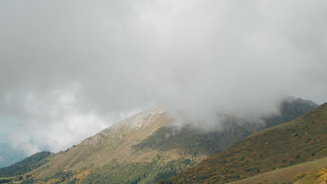 misty mountain peaks in autumn