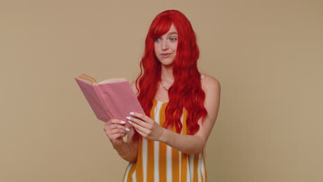 Redhead-woman-reading-funny-interesting-fairytale-story-book,-leisure-hobby,-education,-learning