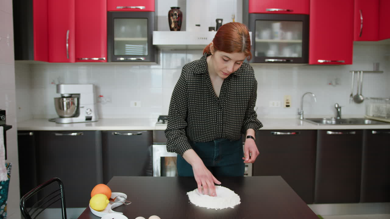 Woman Prepares Flour For A Typical Italian Dessert In The Kitchen