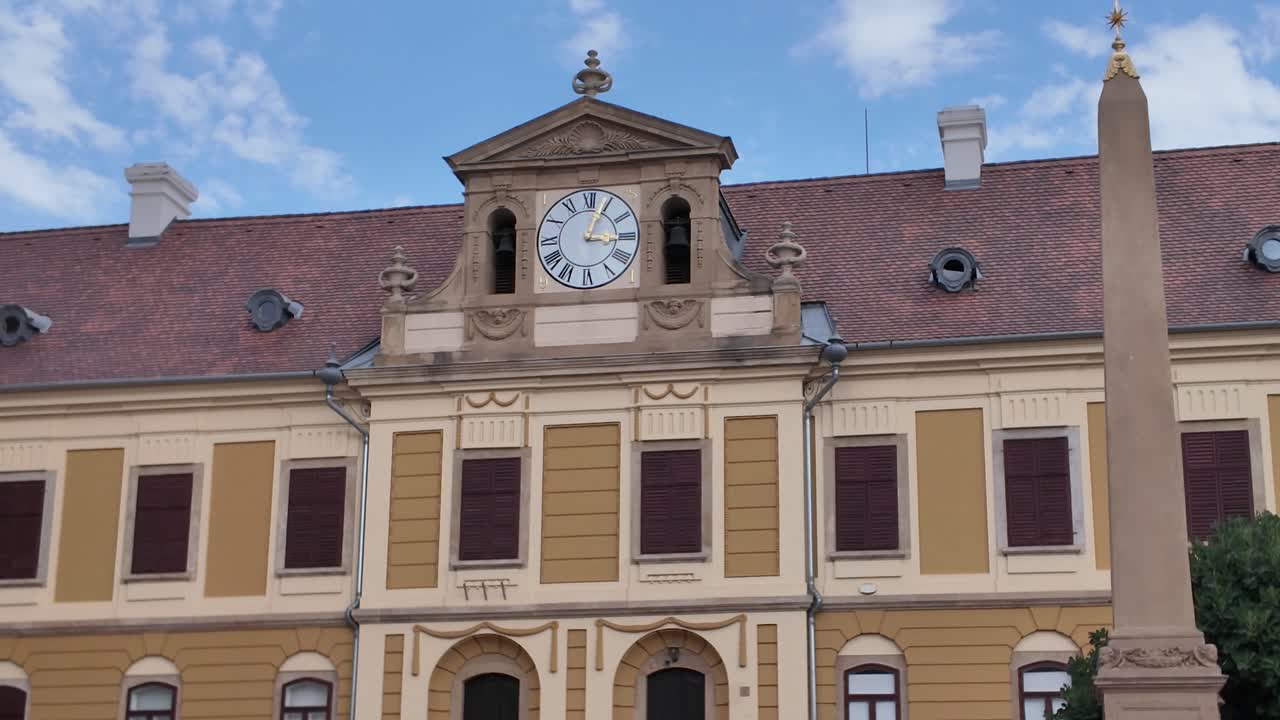 Exterior view of the Episcopal Archive of Pécs, showcasing historic architecture and ornate facade details