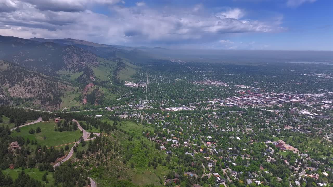 Front range town of Boulder Colorado summer spring aerial drone Chautauqua Park Flatirons Green mountain Pearl Street Mall Eben G Fine Park Boulder creek college University blue sky sunny forward pan