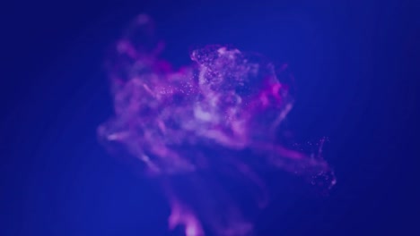 animation of glowing pink particles moving on blue background