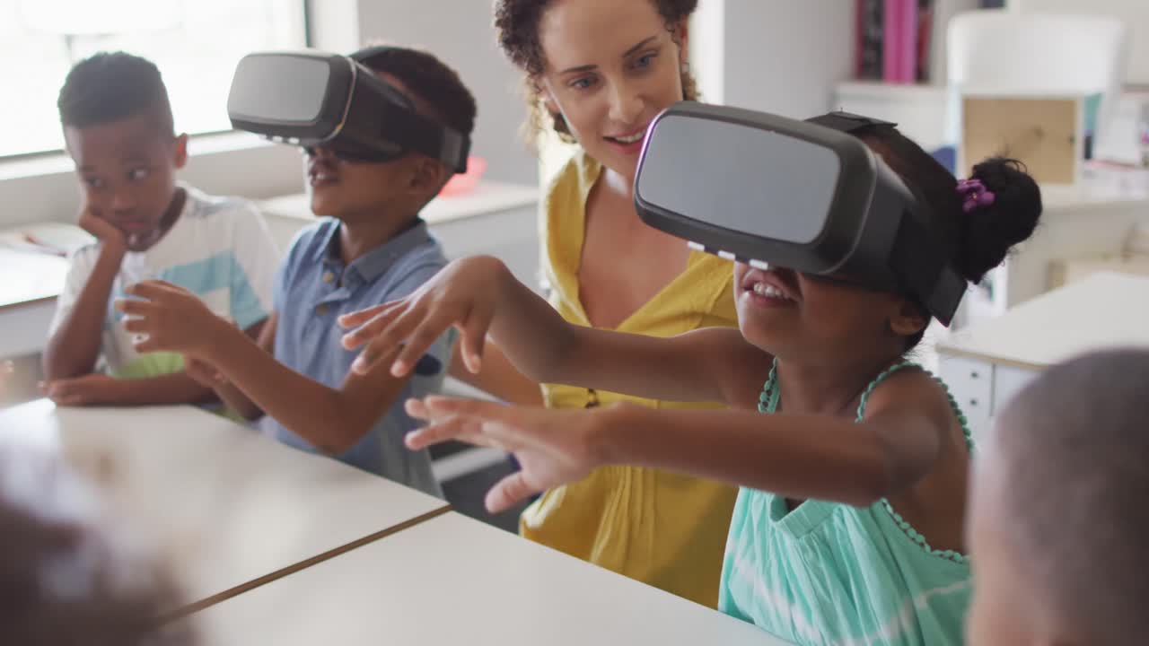 Video of happy caucasian female teacher with class of diverse pupils wearing vr headsets