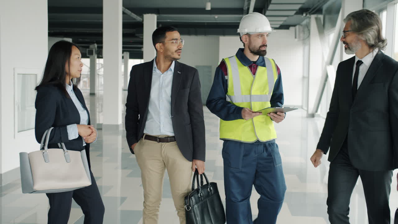 Business Meeting on Construction Site
