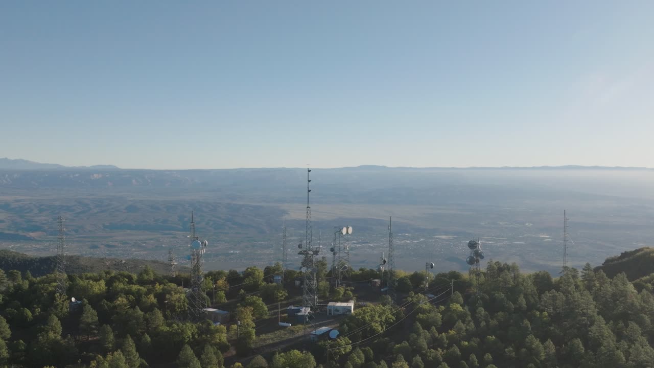 Aerial Drone View of Mingus Mountain Broadcast Towers Overlooking the Verde Valley and Distant Mountains