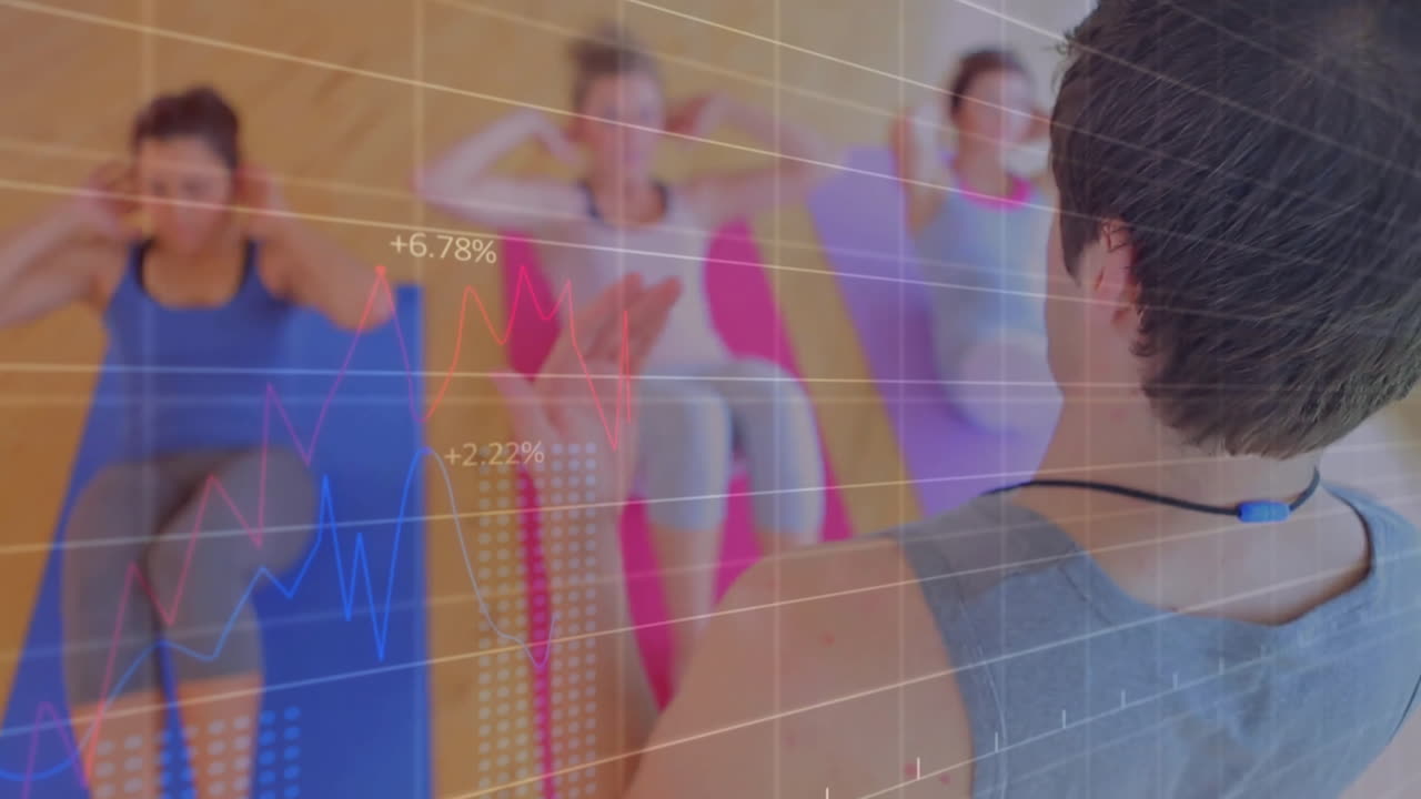 "male instructor guiding trainees doing sit-ups on mats in fitness class, displaying metric graphs"
