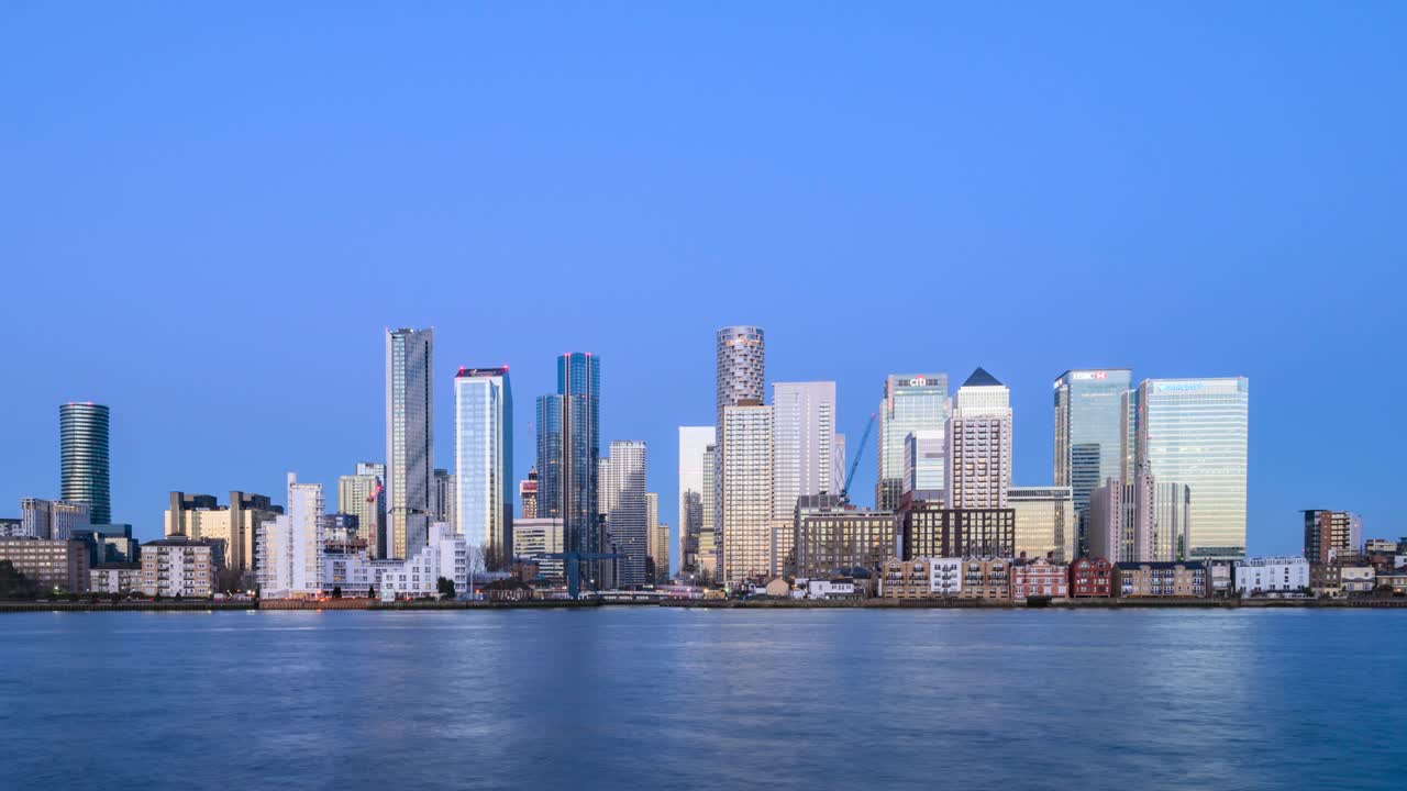 Time-lapse da noite para o dia de Canary Wharf, Londres.