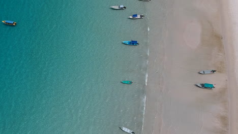 paradise beach turquoise water perhentian island malaysia costal rocks drone
