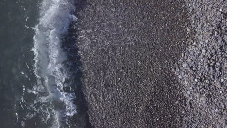 sea waves over rocky beach shore