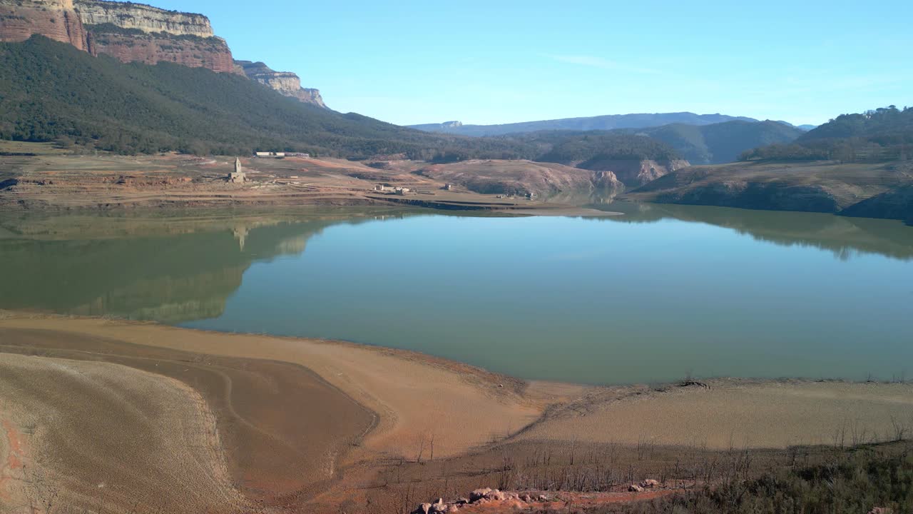 Sau swamp dike in Catalonia, Spain, Drone flight over desert land, dry lake in Spain intense drought in 2024