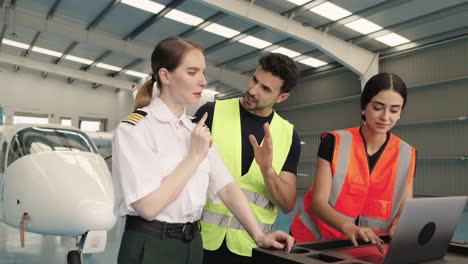 aircraft maintenance team working in hangar