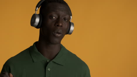 african american man on yellow background.