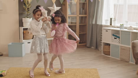little girls having fun at home