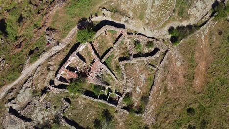 beautiful ruins landscape filmed with mini drone flying around a medieval village in spain close to madrid