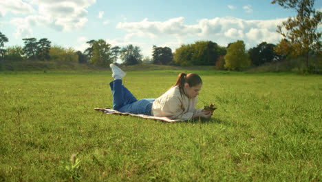woman relaxing in a park on a sunny day
