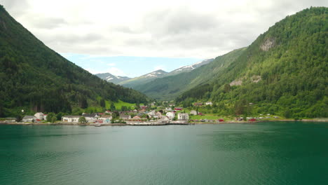 Panorama-Of-Eidsdal-Village-With-Mountains-In-Background-From-Geirangerfjord-In-Norway