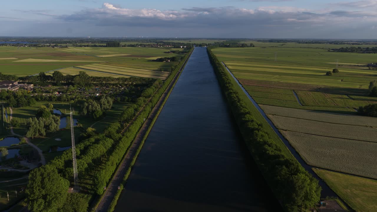 Amsterdam rhine canal, bridge, infrastructure and waterway near Weesp, The Netherlands. Aerial video