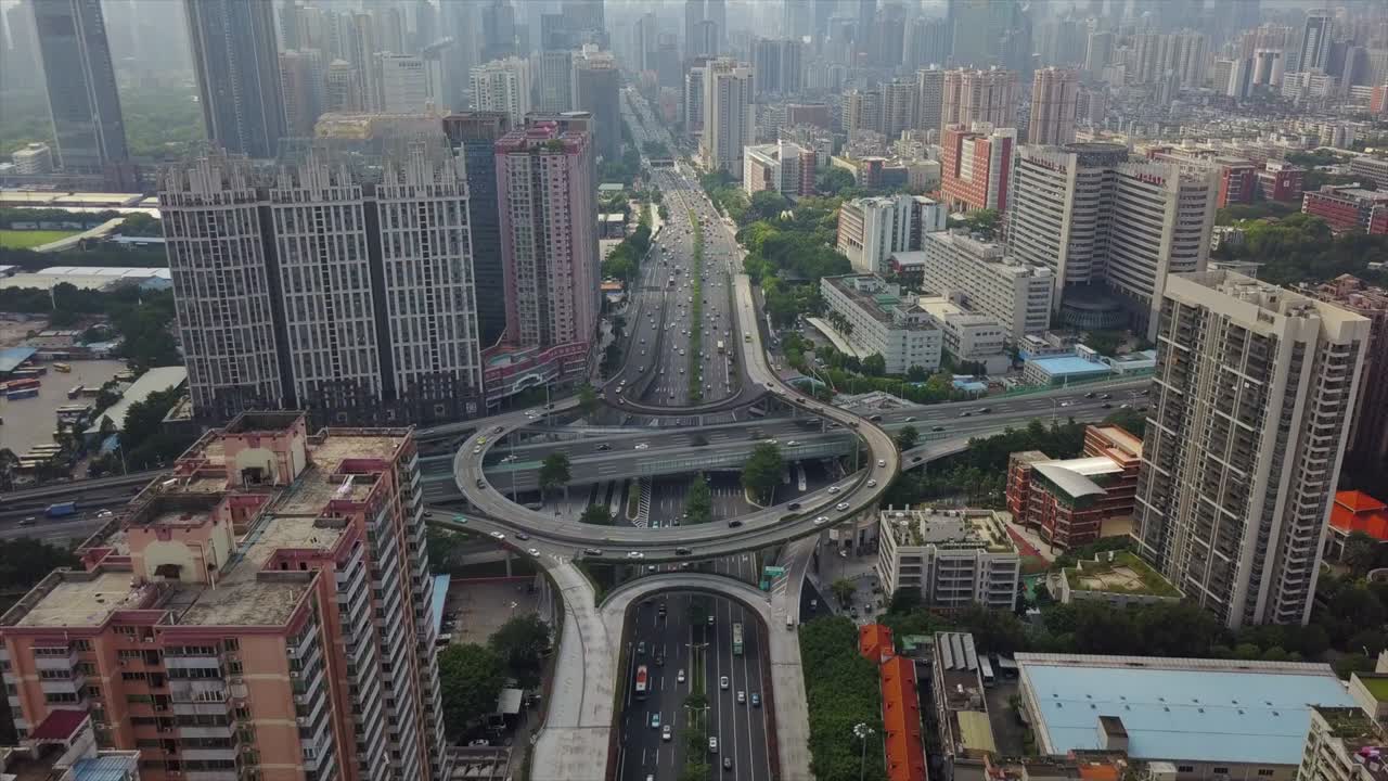 china hora del día guangzhou paisaje urbano tráfico carretera cruce panorama aéreo 4k
