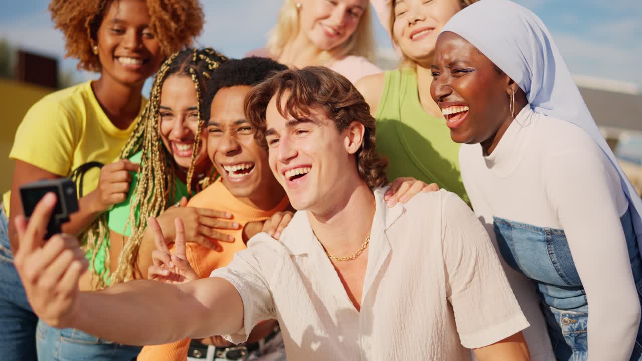 Multi-ethnic people recording with wearable camera outdoors