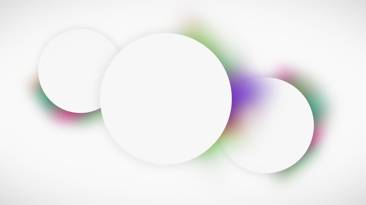 Three overlapping white circles, each having its rotating slice of a vibrant halo around it, creating a serene looping background animation