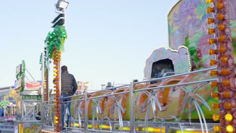 colorful amusement park ride with people