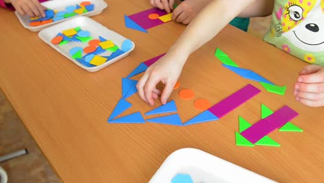 children playing with shapes