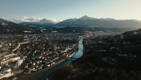 Aerial-drone-shot-of-city-of-Innsbruck,-Tyrol,-Austria