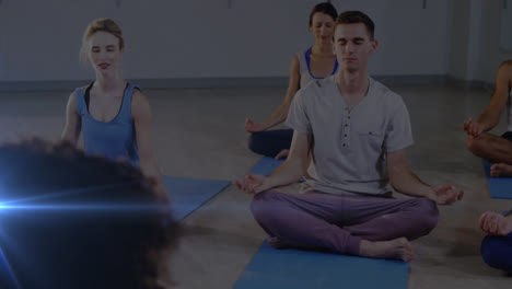 animation of glowing light over people practicing yoga