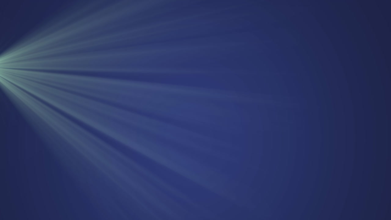 Animation of light rays against blue background