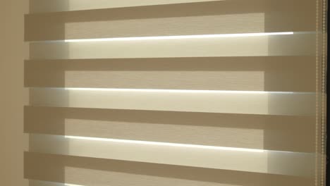 close-up of beige venetian blinds