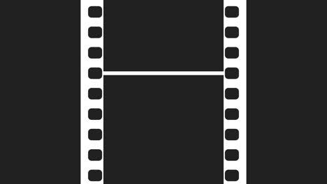 una tira de película de 35 mm que se mueve sobre un fondo negro. imágenes de video en bucle sin fisuras en una pantalla negra sólida. plantilla de diseño de tira de película abstracta.