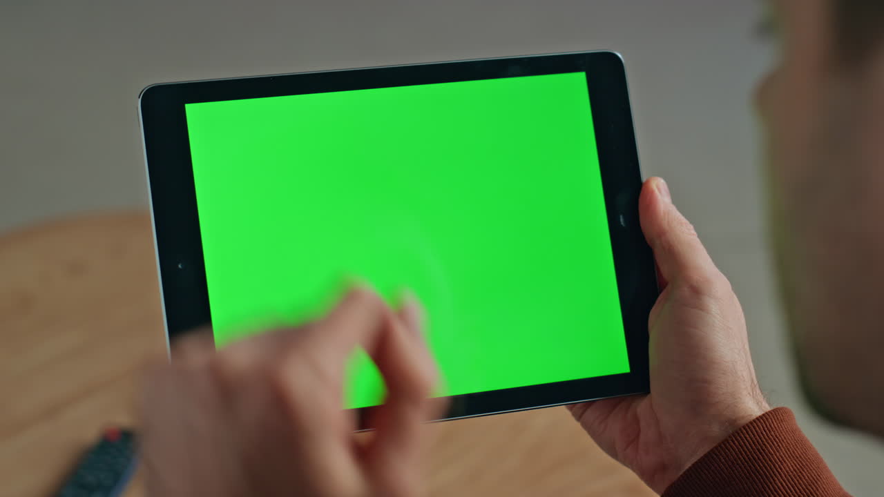 Mockup tablet worker scrolling display browsing social media at office closeup