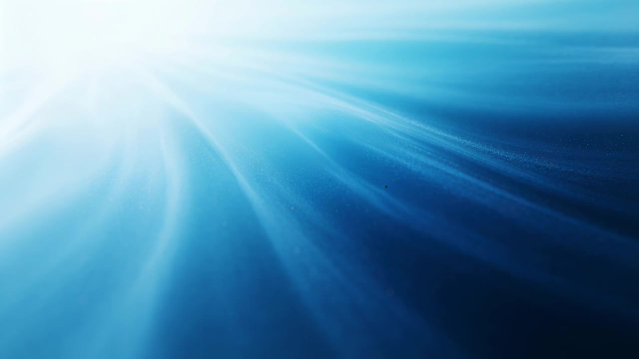 Bagliore bianco che si sposta in alto a sinistra, irradiando raggi blu in sfumatura attraverso i fotogrammi, mostrando due puntini a destra