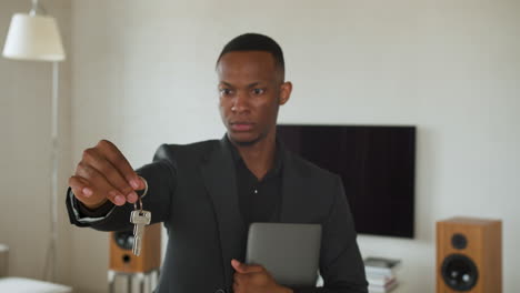 man with keys of new house