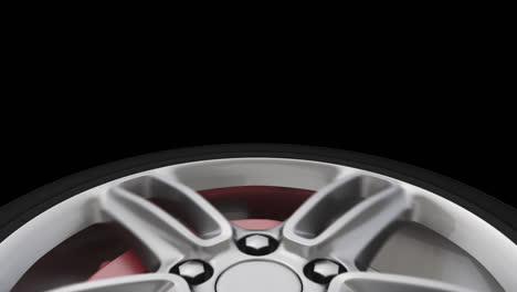 close-up of a silver alloy car wheel