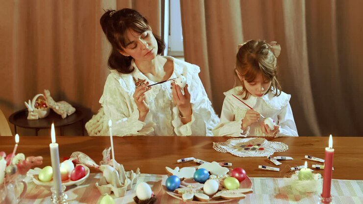 Mother and Daughter Painting Easter Eggs