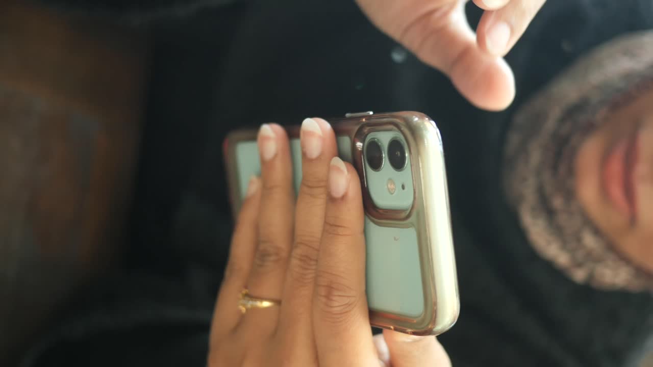 Close up of a person holding a mobile phone
