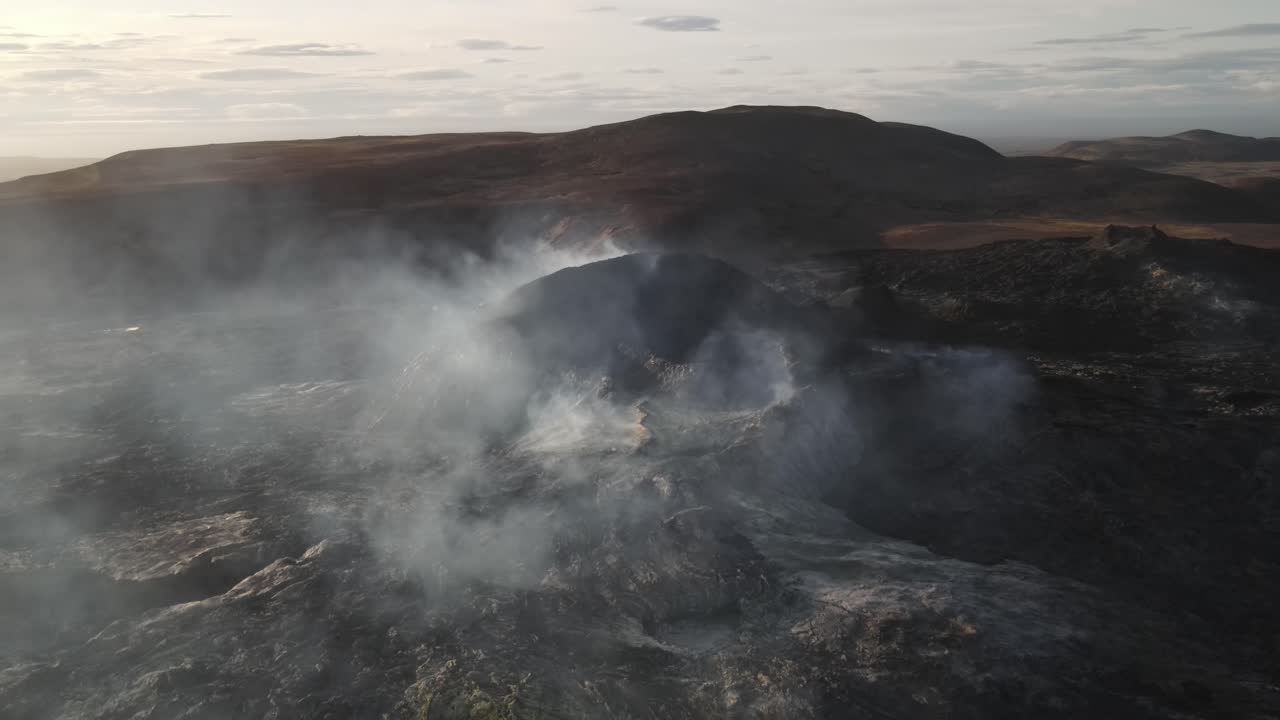 Aerial View of a Volcanic Landscape with Smoke